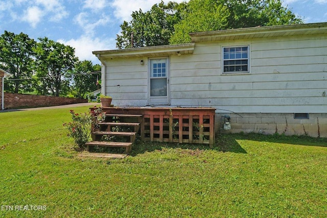 110 Clark Ave, Jamestown, TN 38556 - back of property featuring a yard and crawl space