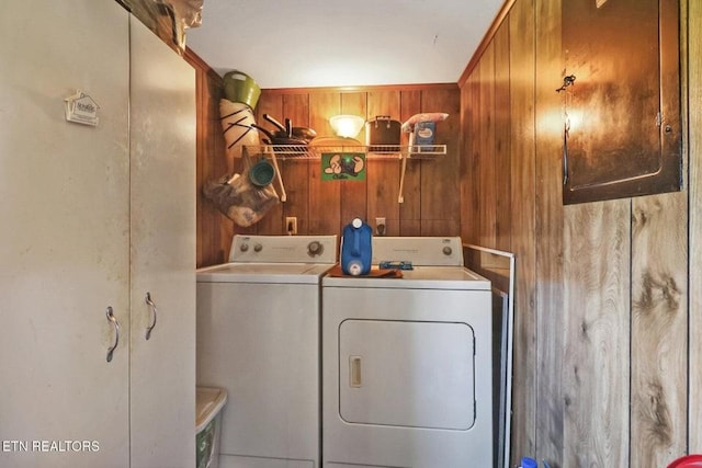 110 Clark Ave, Jamestown, TN 38556 - laundry area with washing machine and dryer and wooden walls