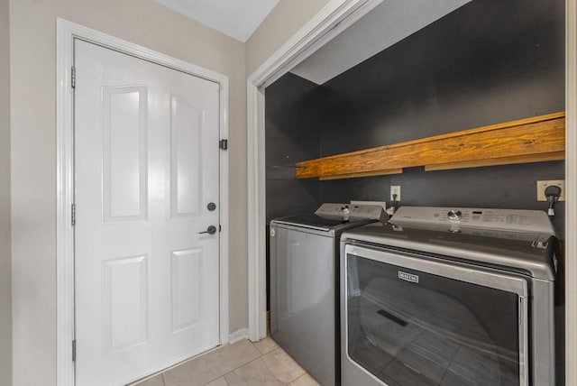 3792 Cindy Jo Dr N, Clarksville, TN 37040 - washroom with separate washer and dryer and light tile patterned floors