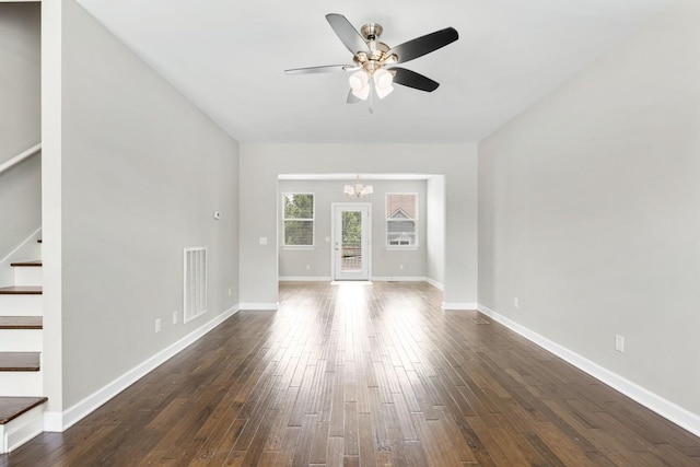 708 Ellie Dr, Madison, TN 37115 - unfurnished living room featuring a chandelier, dark wood-style floors, and a ceiling fan