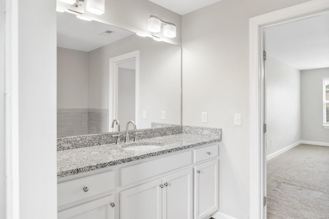 708 Ellie Dr, Madison, TN 37115 - bathroom featuring vanity and baseboards