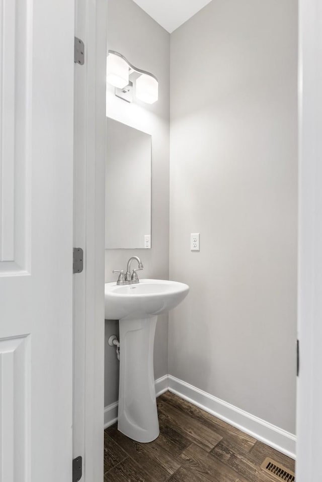 708 Ellie Dr, Madison, TN 37115 - bathroom with wood finished floors and baseboards