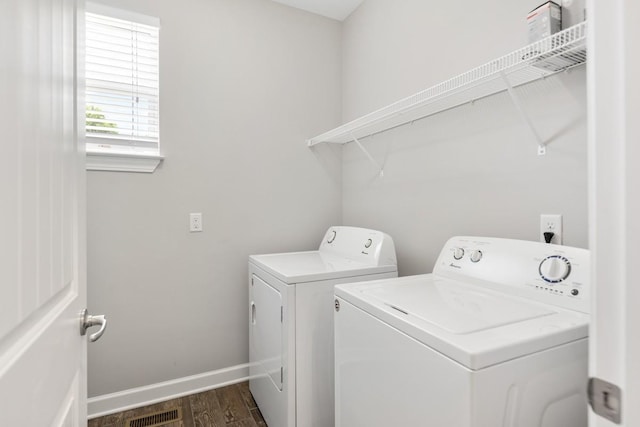 708 Ellie Dr, Madison, TN 37115 - laundry area featuring washing machine and dryer and dark wood-style floors