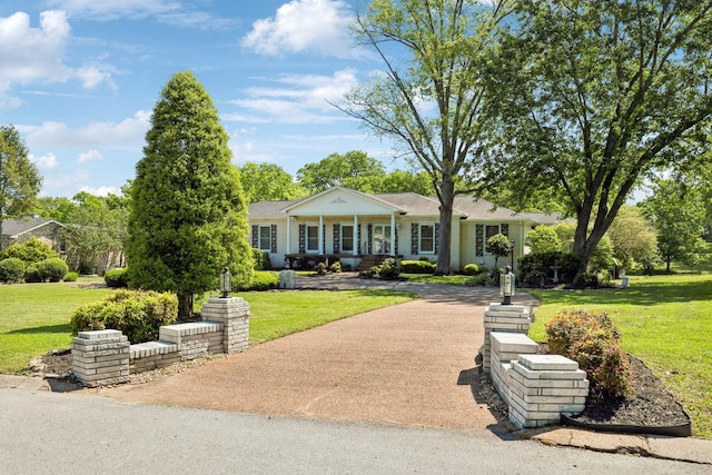 223 Kennett Rd, Old Hickory, TN 37138 - neoclassical home with a front yard and a porch