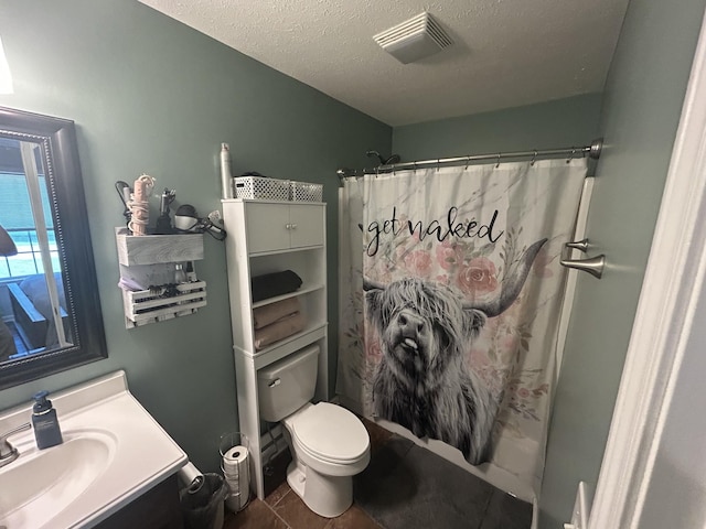 49 Rebecca Ln W, Estill Springs, TN 37330 - bathroom featuring vanity, a textured ceiling, tile patterned flooring, and a shower with curtain