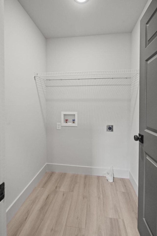 165 Lear Rd, Portland, TN 37148 - washroom featuring hookup for an electric dryer, washer hookup, and light wood-style floors