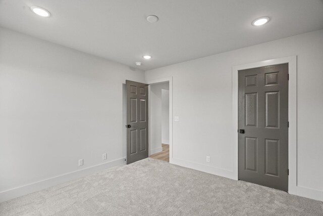 165 Lear Rd, Portland, TN 37148 - unfurnished bedroom featuring light colored carpet and recessed lighting