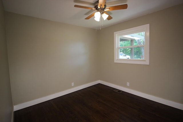 762 Austin Bottom Rd, Baxter, TN 38544 - unfurnished room featuring dark wood-style floors and ceiling fan