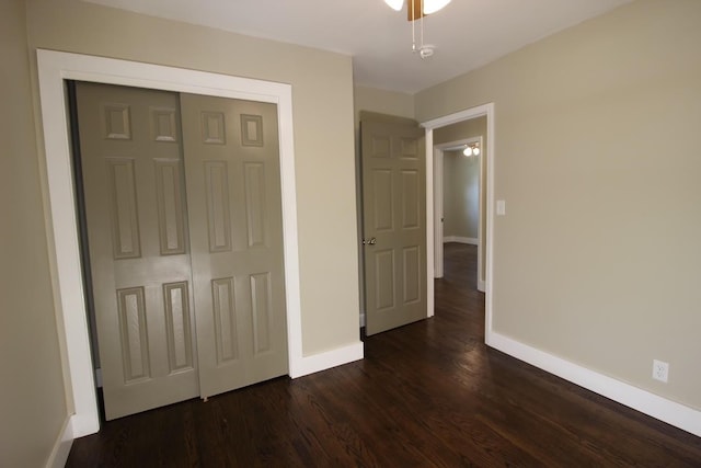 762 Austin Bottom Rd, Baxter, TN 38544 - unfurnished bedroom featuring dark wood-type flooring and a closet