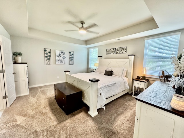 1229 Inverness Pass, Lebanon, TN 37087 - bedroom with a raised ceiling, light carpet, and ceiling fan