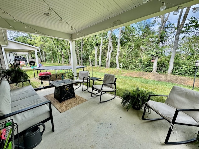 1229 Inverness Pass, Lebanon, TN 37087 - view of patio / terrace with a trampoline, an outdoor living space, and view of scattered trees