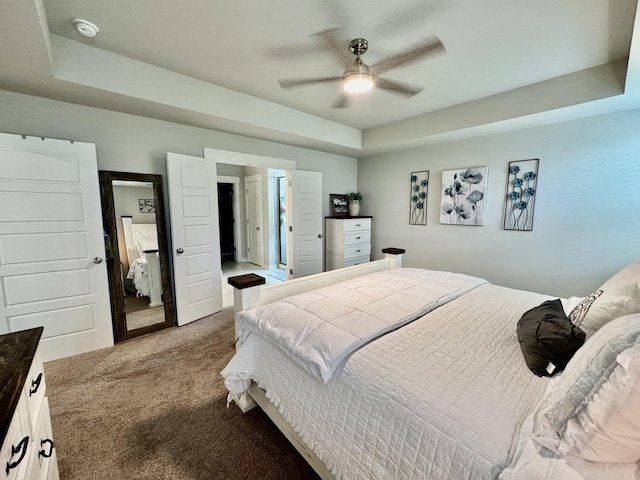 1229 Inverness Pass, Lebanon, TN 37087 - bedroom featuring carpet, a raised ceiling, and a ceiling fan