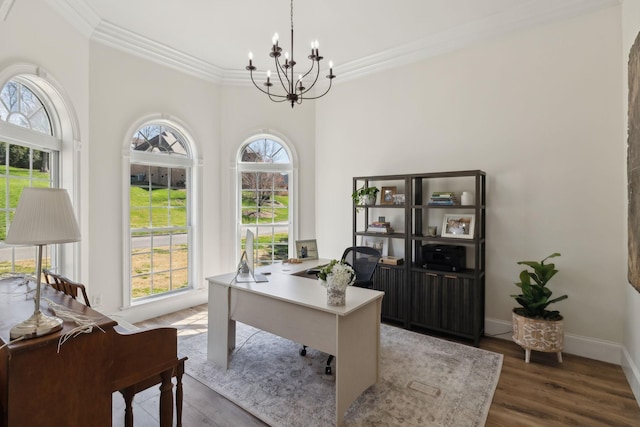 8217 W Chase Ct, Nashville, TN 37221 - office area with a chandelier, healthy amount of natural light, crown molding, a high ceiling, and wood finished floors