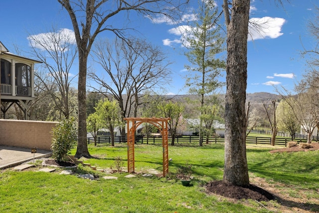 8217 W Chase Ct, Nashville, TN 37221 - view of yard featuring a sunroom and a mountain view