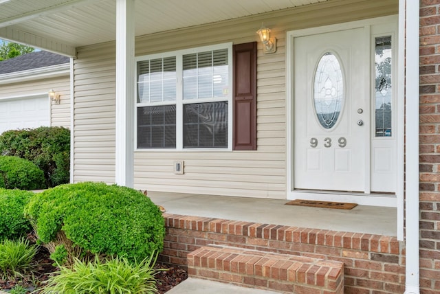 939 Wing Tip Cir, Hopkinsville, KY 42240 - view of exterior entry with a porch