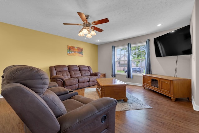 939 Wing Tip Cir, Hopkinsville, KY 42240 - living room featuring ceiling fan, wood finished floors, recessed lighting, and a textured ceiling