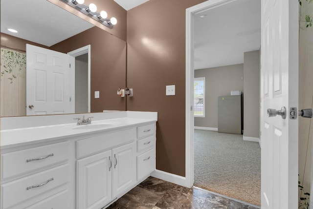 939 Wing Tip Cir, Hopkinsville, KY 42240 - bathroom featuring vanity and baseboards