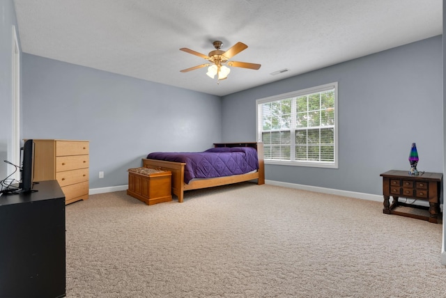 939 Wing Tip Cir, Hopkinsville, KY 42240 - carpeted bedroom with baseboards and a ceiling fan