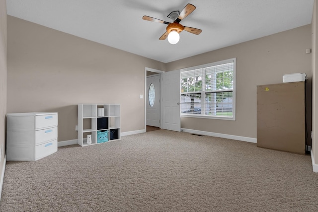 939 Wing Tip Cir, Hopkinsville, KY 42240 - unfurnished living room with a ceiling fan and carpet