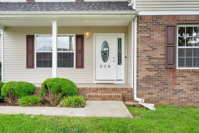 939 Wing Tip Cir, Hopkinsville, KY 42240 - property entrance with brick siding and roof with shingles