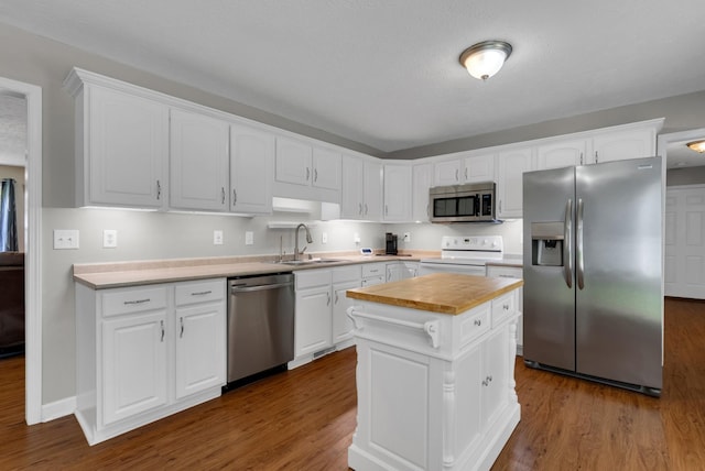 939 Wing Tip Cir, Hopkinsville, KY 42240 - kitchen featuring stainless steel appliances, butcher block countertops, dark wood-style flooring, and white cabinets