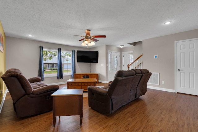 939 Wing Tip Cir, Hopkinsville, KY 42240 - living room with a textured ceiling, wood finished floors, a ceiling fan, stairs, and recessed lighting
