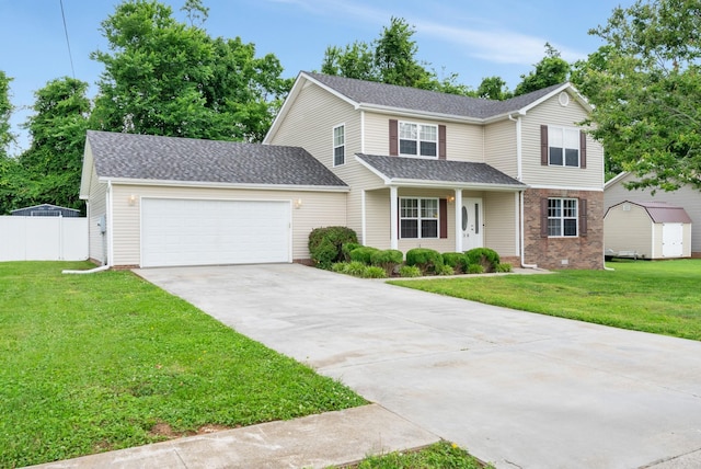 939 Wing Tip Cir, Hopkinsville, KY 42240 - traditional-style home with an attached garage, driveway, and roof with shingles