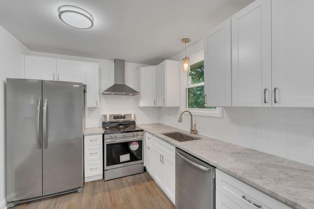 4921 Shihmen Dr, Antioch, TN 37013 - kitchen with stainless steel appliances, wall chimney exhaust hood, and white cabinetry