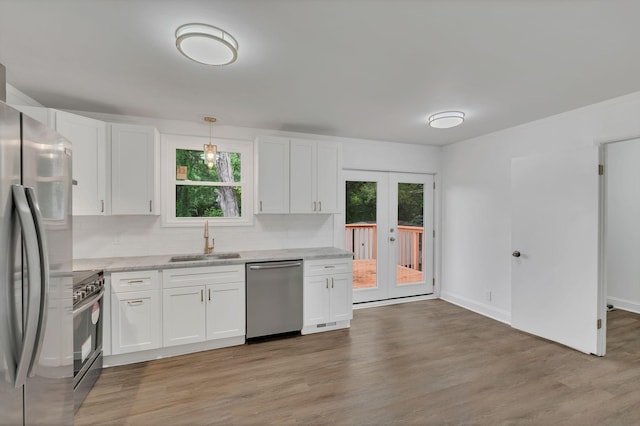 4921 Shihmen Dr, Antioch, TN 37013 - kitchen with stainless steel appliances, french doors, healthy amount of natural light, and backsplash