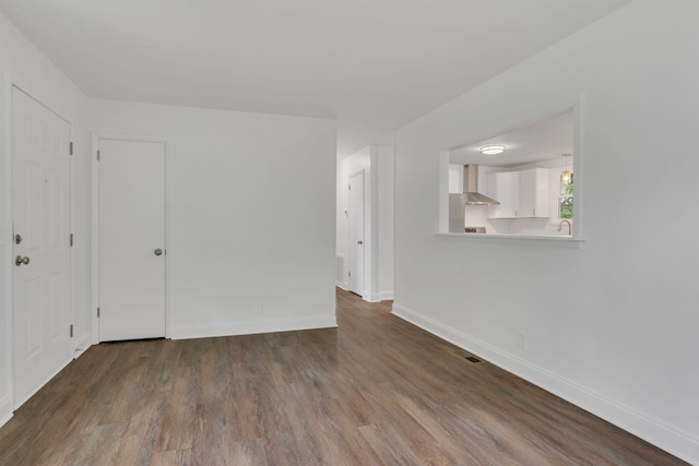 4921 Shihmen Dr, Antioch, TN 37013 - spare room featuring wood finished floors and baseboards