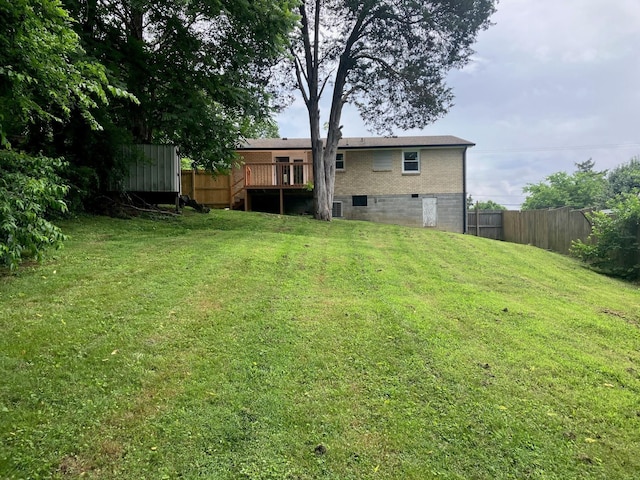 4921 Shihmen Dr, Antioch, TN 37013 - rear view of house featuring a deck and brick siding