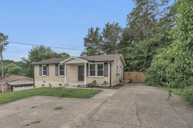 4921 Shihmen Dr, Antioch, TN 37013 - single story home with brick siding, crawl space, a shingled roof, and concrete driveway