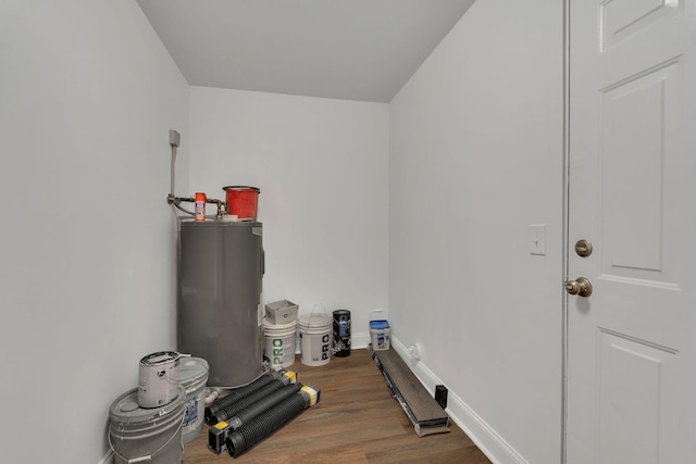 4921 Shihmen Dr, Antioch, TN 37013 - laundry area featuring water heater and wood finished floors