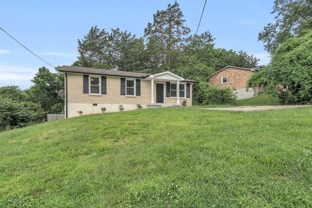 4921 Shihmen Dr, Antioch, TN 37013 - ranch-style home with brick siding, a front yard, and crawl space