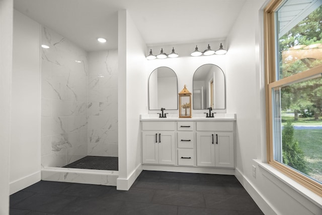 5670 Lakeview Rd, Springfield, TN 37172 - bathroom featuring double vanity, a marble finish shower, tile patterned flooring, and recessed lighting
