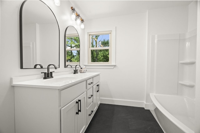 5670 Lakeview Rd, Springfield, TN 37172 - full bathroom with double vanity, tile patterned floors, and shower / washtub combination