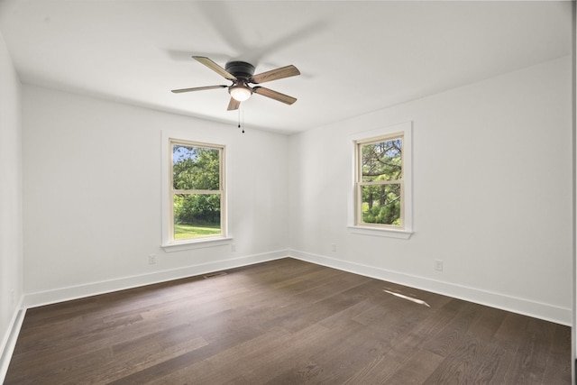 5670 Lakeview Rd, Springfield, TN 37172 - empty room featuring plenty of natural light, dark wood-type flooring, and a ceiling fan