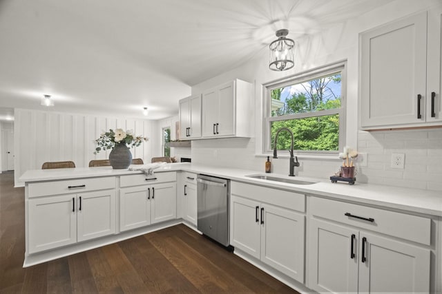 5670 Lakeview Rd, Springfield, TN 37172 - kitchen with dishwasher, a peninsula, tasteful backsplash, light countertops, and dark wood-type flooring