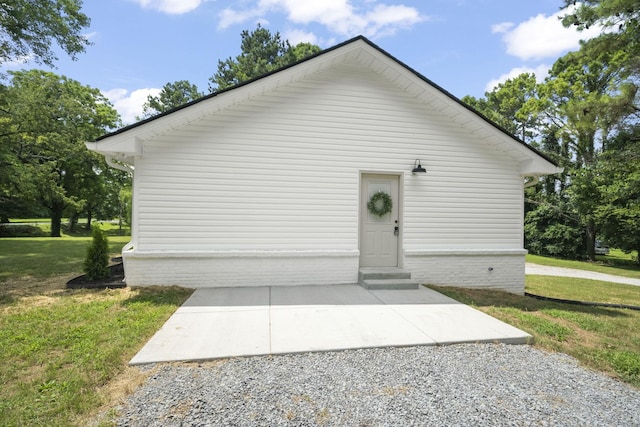 5670 Lakeview Rd, Springfield, TN 37172 - view of property exterior featuring a yard, entry steps, and a patio area