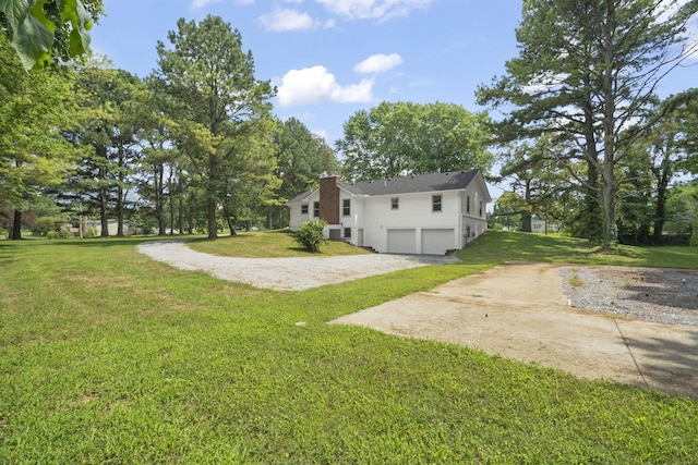 5670 Lakeview Rd, Springfield, TN 37172 - view of grassy yard with concrete driveway and an attached garage