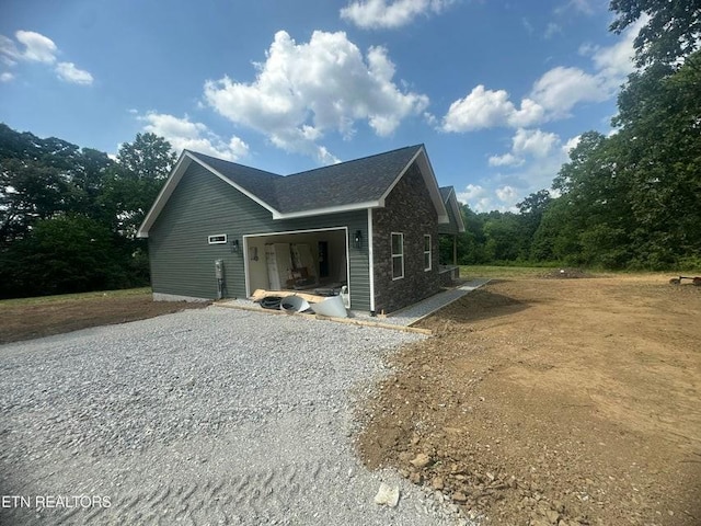 250 Old Grimsley Ct, Grimsley, TN 38565 - view of home's exterior with gravel driveway