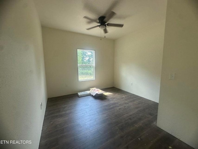 250 Old Grimsley Ct, Grimsley, TN 38565 - empty room featuring a ceiling fan and dark wood finished floors