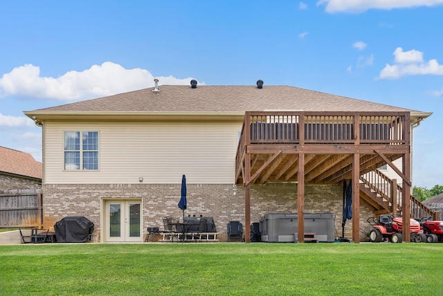 1192 Wicke Rd, Adams, TN 37010 - rear view of property featuring a hot tub, brick siding, french doors, a wooden deck, and stairs