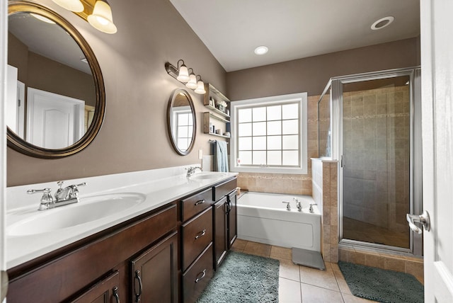 1192 Wicke Rd, Adams, TN 37010 - full bath featuring a garden tub, a stall shower, tile patterned floors, and double vanity