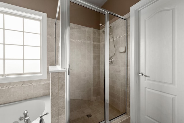1192 Wicke Rd, Adams, TN 37010 - bathroom featuring a stall shower and a tub with jets