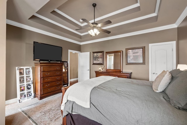 1192 Wicke Rd, Adams, TN 37010 - carpeted bedroom with a tray ceiling, ornamental molding, and a ceiling fan