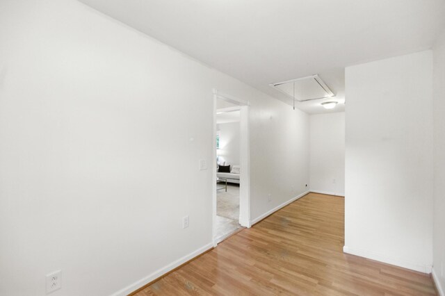 215 Patrick St, Estill Springs, TN 37330 - empty room featuring attic access and light wood-type flooring