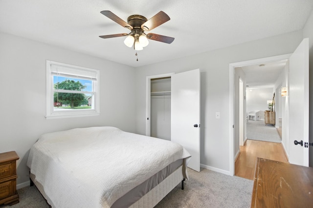 215 Patrick St, Estill Springs, TN 37330 - bedroom featuring light colored carpet, a closet, and a ceiling fan