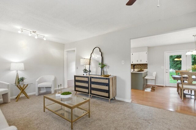 215 Patrick St, Estill Springs, TN 37330 - living room featuring light carpet and a ceiling fan