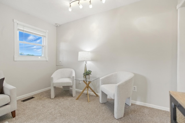 215 Patrick St, Estill Springs, TN 37330 - living area with carpet flooring and baseboards
